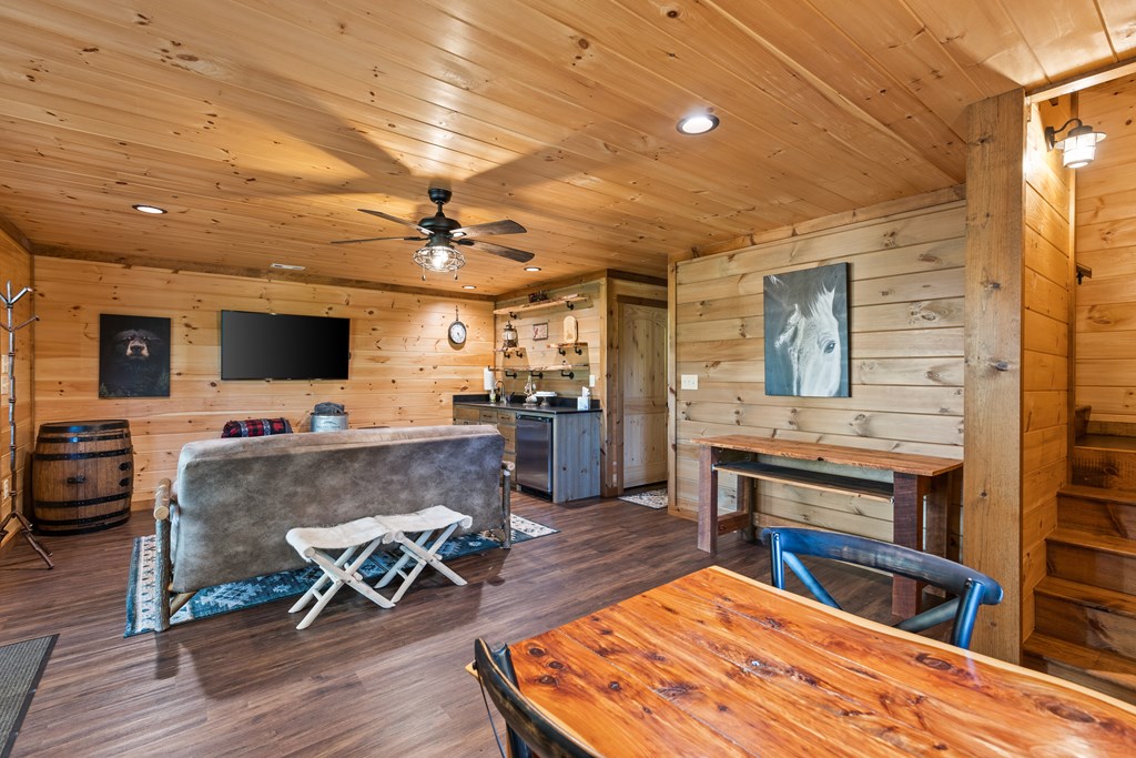 89 Whispering Hawk Trail Morganton, GA 30560 - Photo 18 of 33 a living room with furniture and a flat screen tv