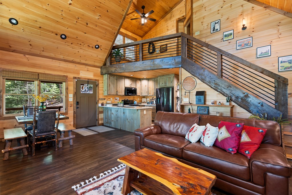 89 Whispering Hawk Trail Morganton, GA 30560 - Photo 4 of 33 a living room with furniture and wooden floor