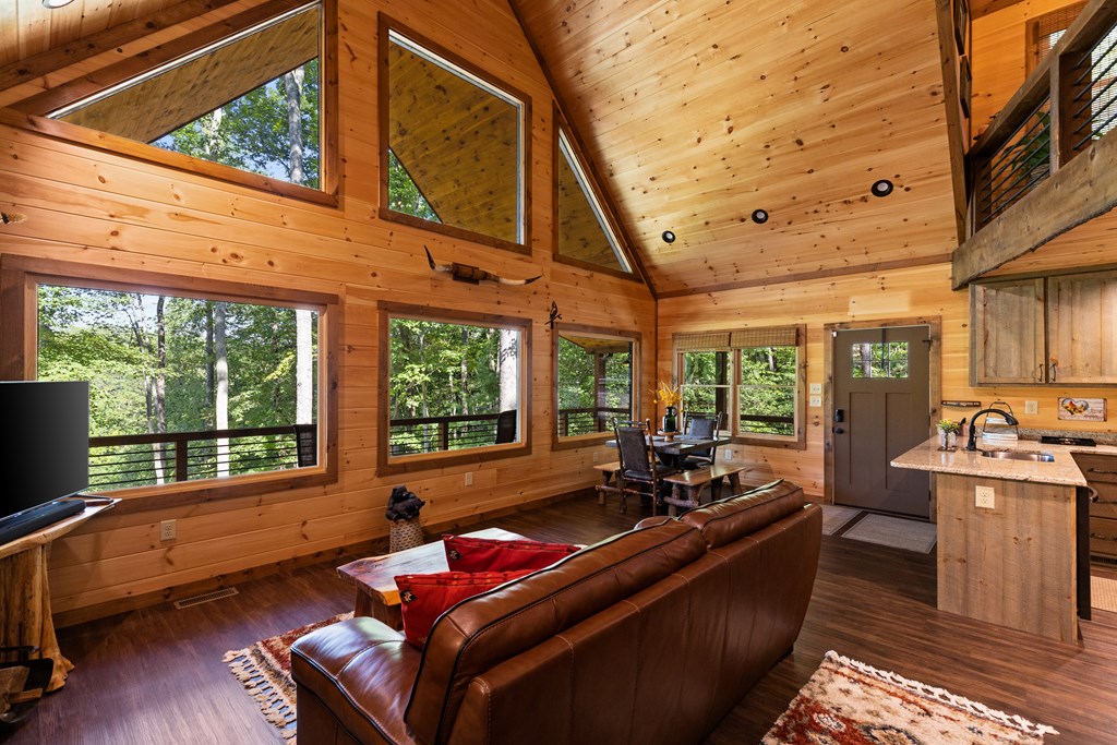 89 Whispering Hawk Trail Morganton, GA 30560 - Photo 5 of 33 a living room with furniture and a large window