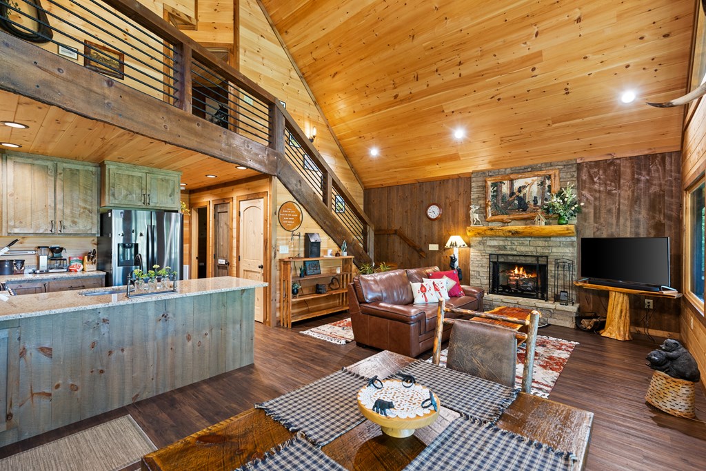 89 Whispering Hawk Trail Morganton, GA 30560 - Photo 7 of 33 a living room with furniture and a fireplace