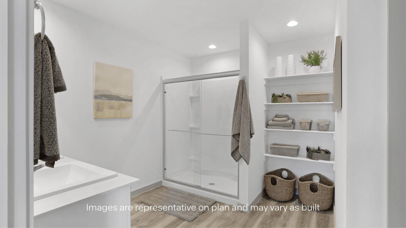 7815 94th Street Lubbock, TX 79424 - Photo 9 of 15 a bathroom with a sink and a mirror