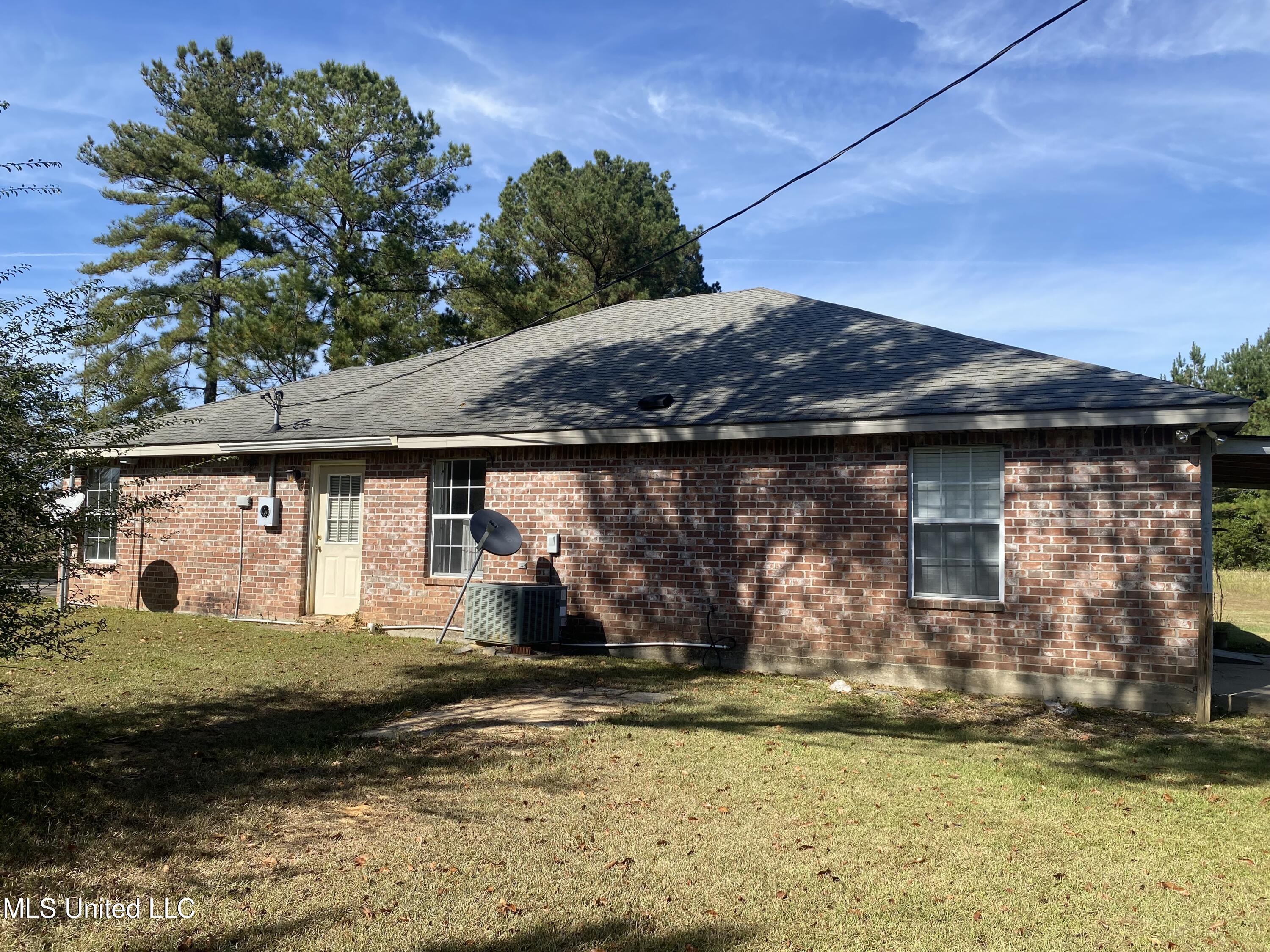 112 Pap Armstrong Road Wiggins, MS 39577 - Photo 16 of 17 Side