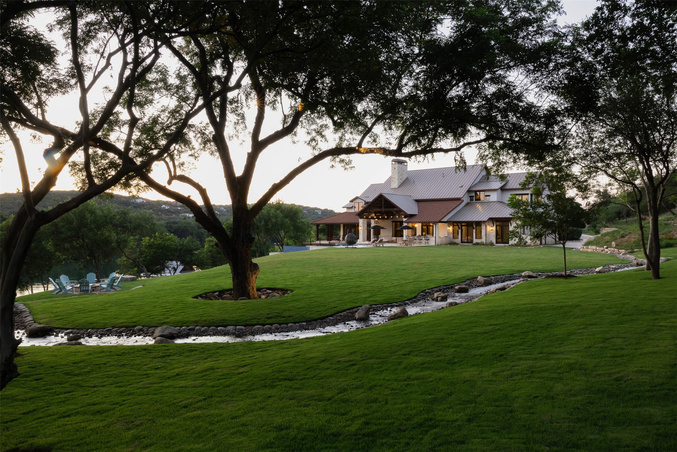 15016 Flat Top Ranch Road Austin, TX 78732 - Photo 14 of 40 View of community with a patio area and a yard