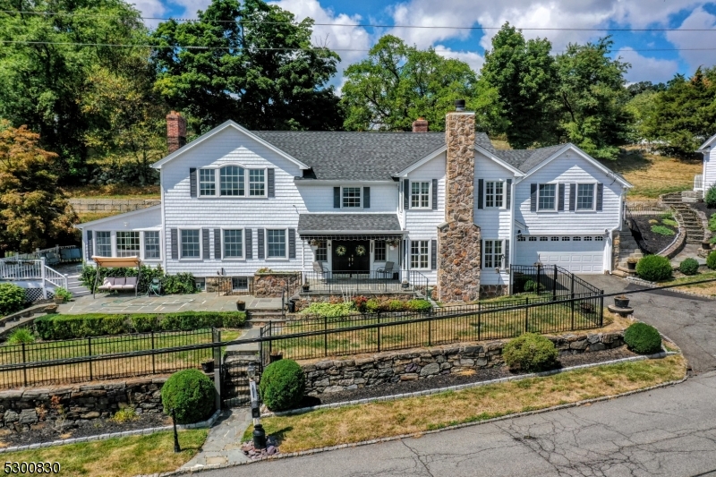 23 Charlottesburg Road Boonton, NJ 07005 - Photo 11 of 26 a front view of a house with a yard