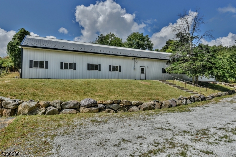 23 Charlottesburg Road Boonton, NJ 07005 - Photo 18 of 26 a view of a house with a big yard