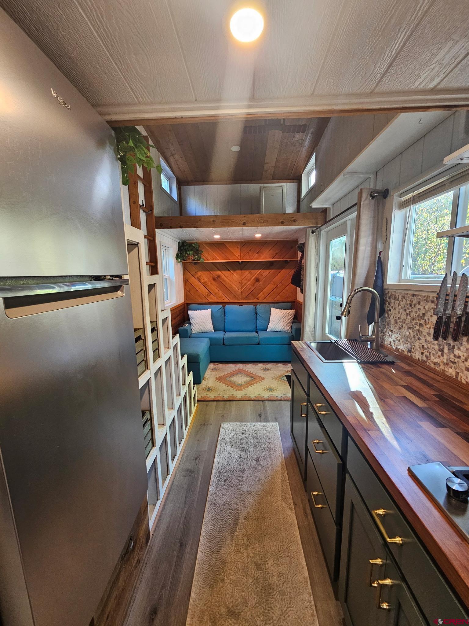 485 Florida Road, Unit C17 Durango, CO 81301 - Photo 7 of 11 a view of a hallway with wooden floor