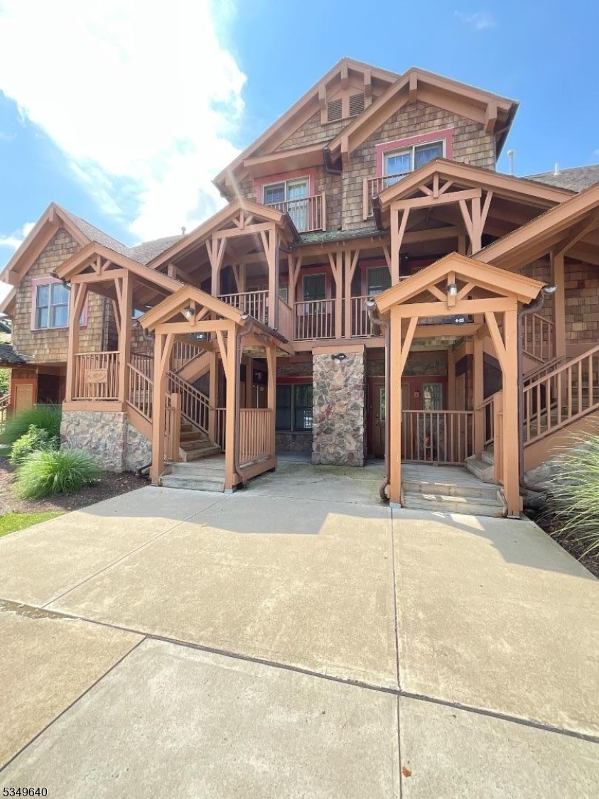 a front view of a house with a garage