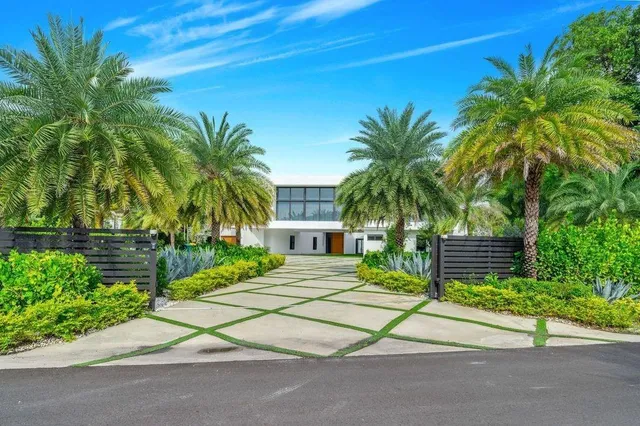 a house with a yard and a trees