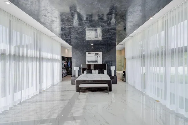 a view of swimming pool with a patio and a yard