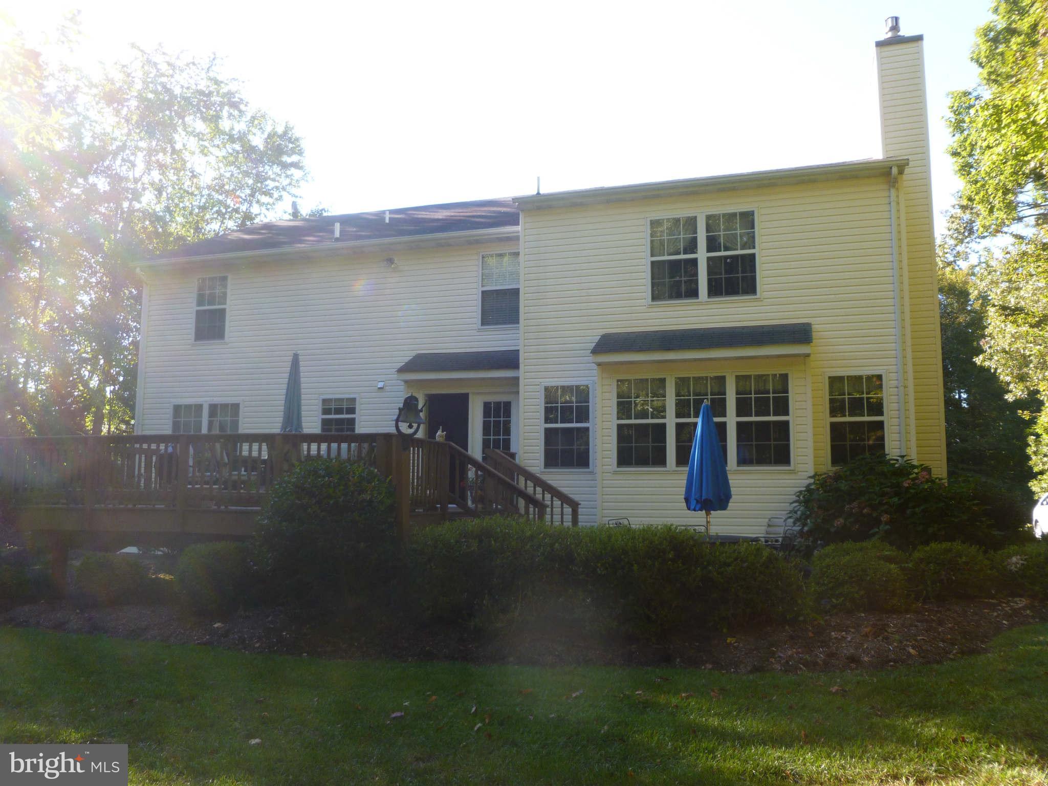 670 Small Reward Road Huntingtown, MD 20639 - Photo 25 of 26 a front view of a house with a yard