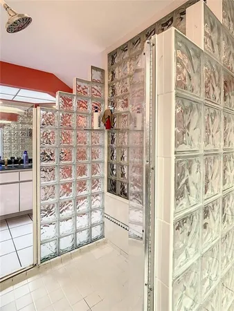 a bathroom with a shower and a toilet