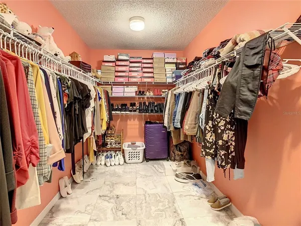 a bathroom with a toilet a sink and a mirror