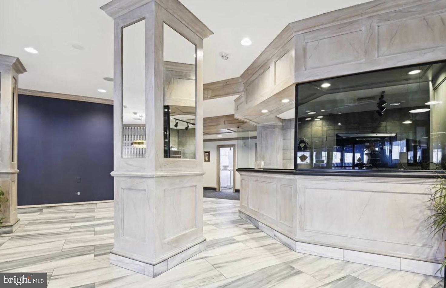 205 East Joppa Road, Unit 808 Towson, MD 21286 - Photo 4 of 37 Front desk w/24 hour security