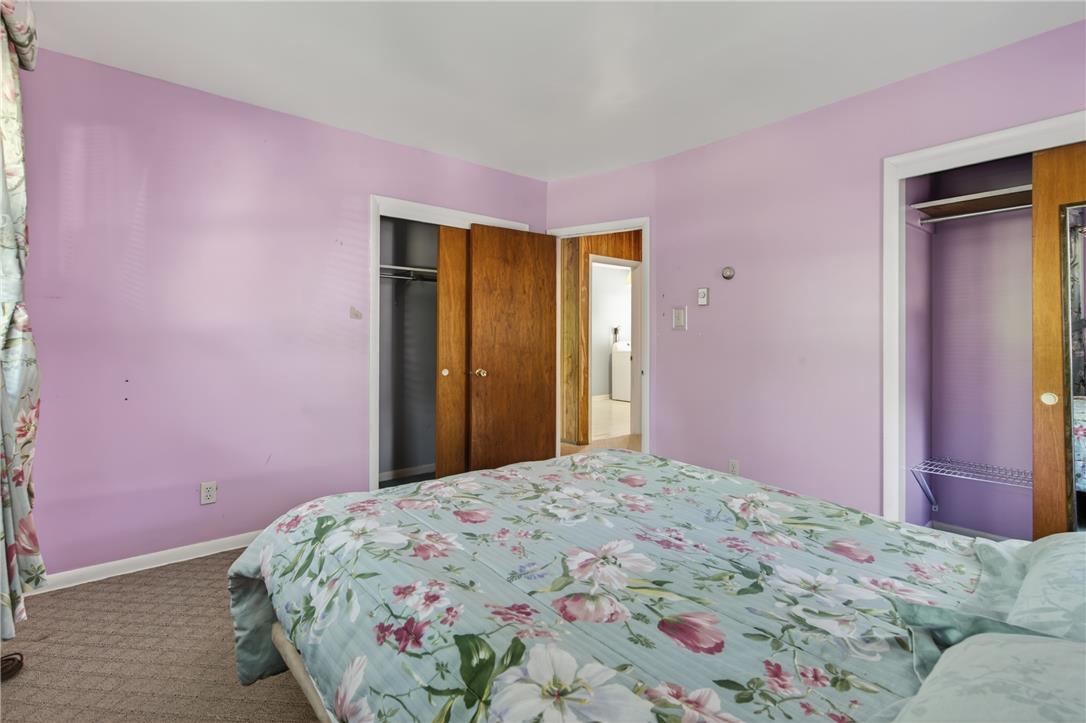 18 White Oak Road Nesquehoning, PA 18240 - Photo 23 of 52 A comfortable bedroom with soft lavender walls and plush carpet, offering a cozy retreat.