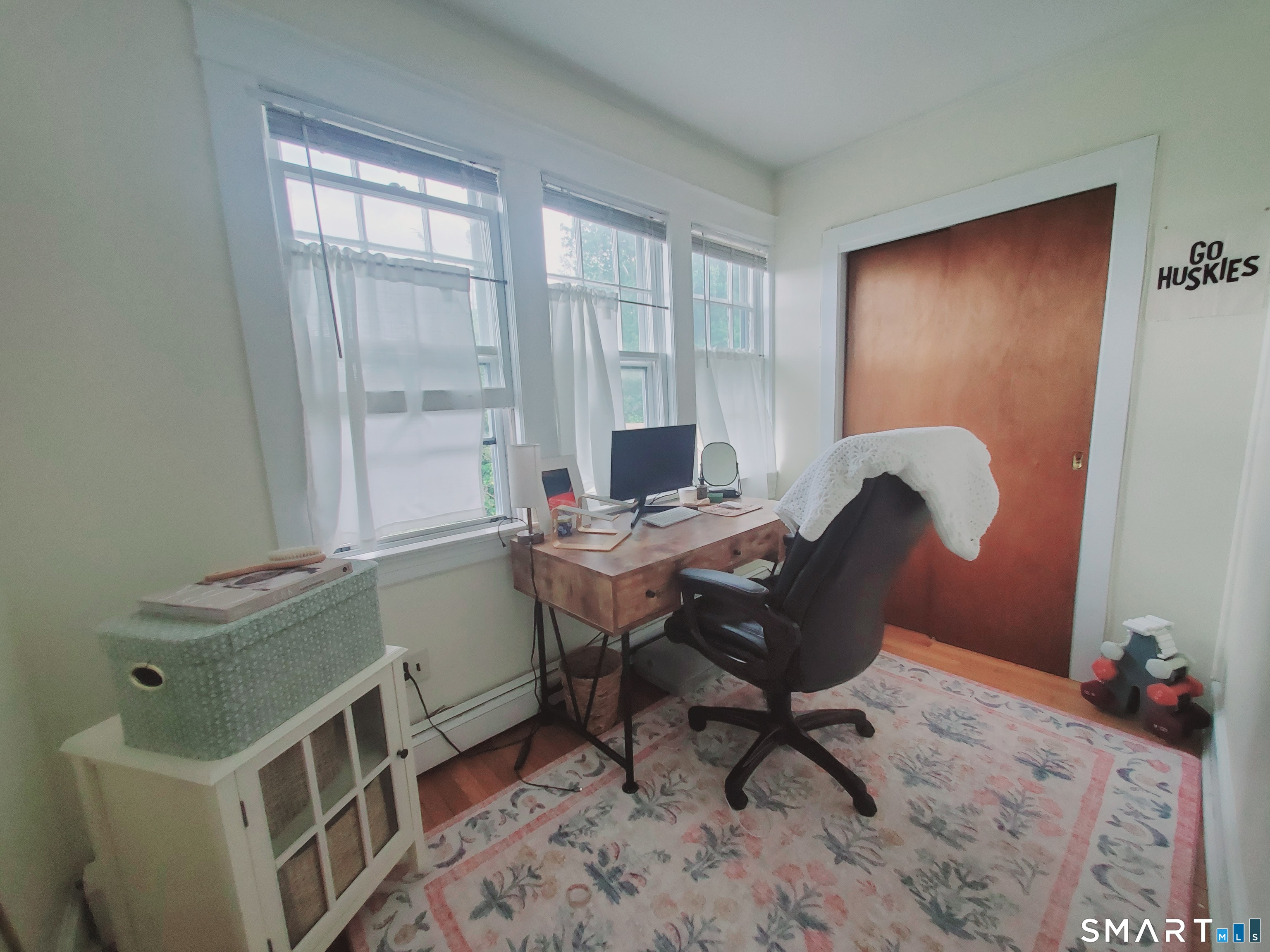 100 Colonial Road, Unit 2 Stamford, CT 06906 - Photo 8 of 8 a view of a workspace with furniture and a window