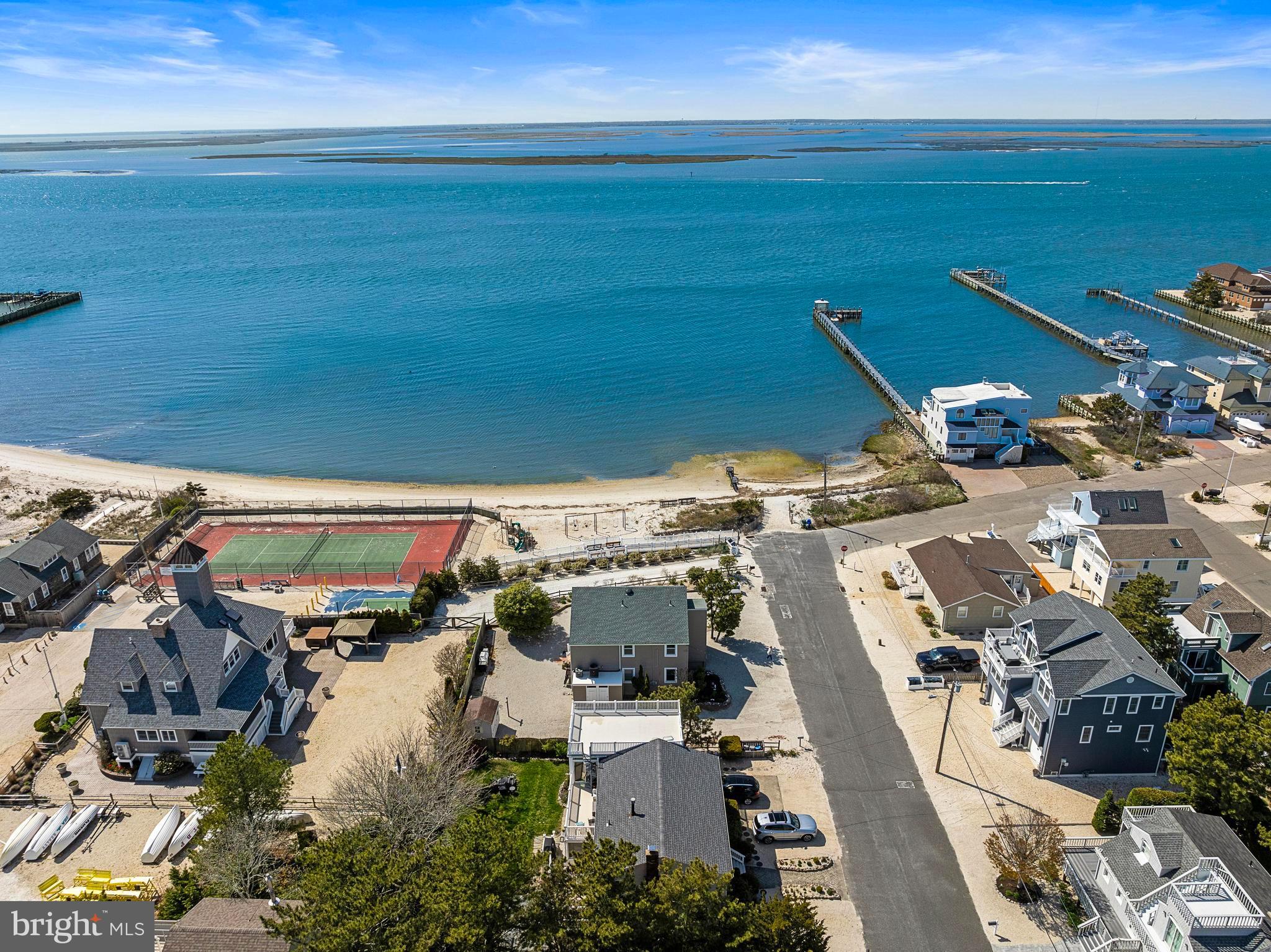 24 Joan Road Long Beach Township, NJ 08008 - Photo 45 of 55 an aerial view of residential houses with outdoor space