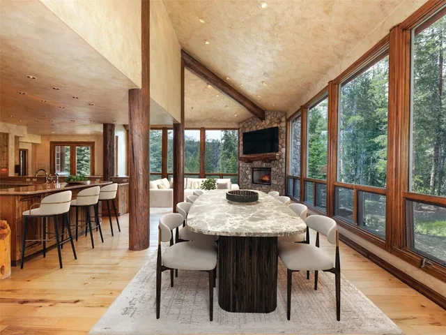 a view of a dining room with furniture window and chairs