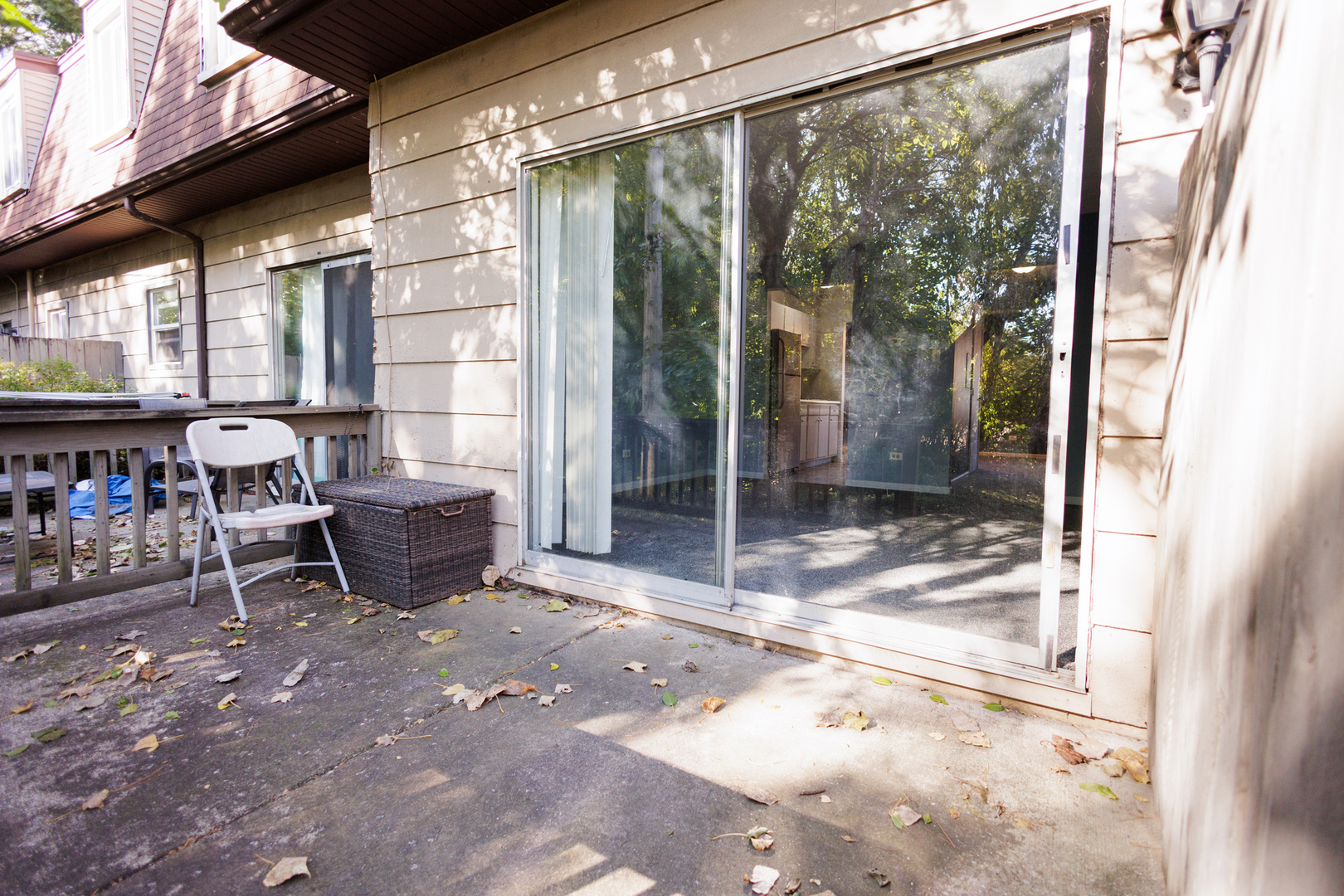 1119 South Curtis Avenue, Unit F62 Kankakee, IL 60901 - Photo 30 of 32 a building outdoor space with patio furniture and potted plants