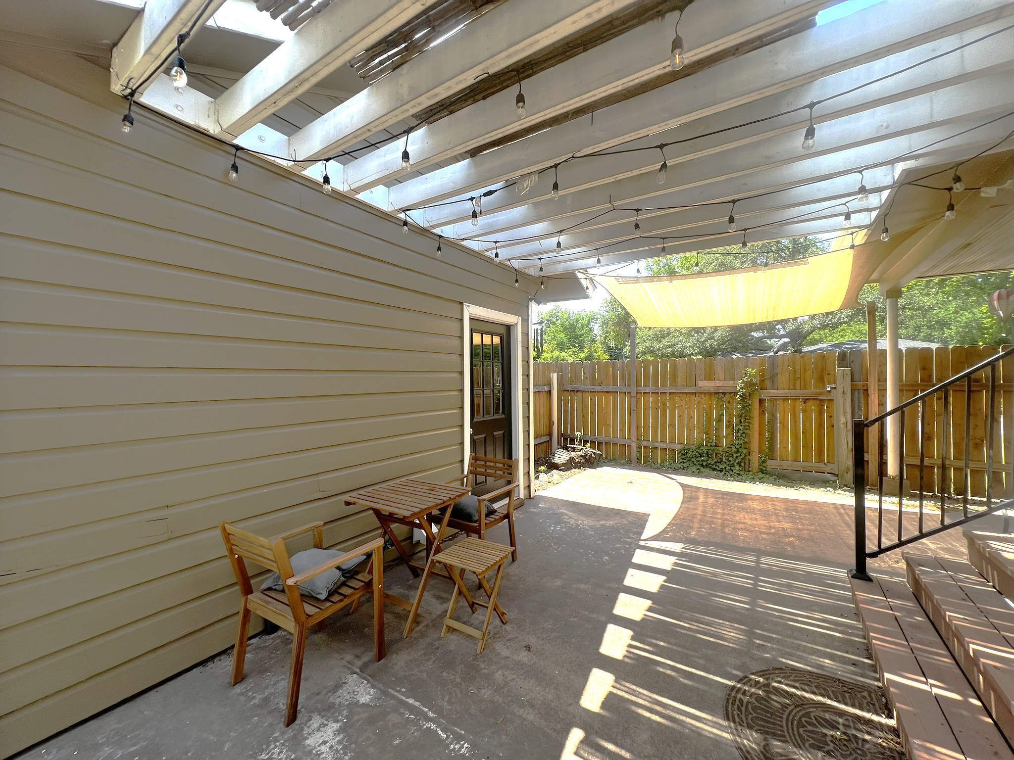 1311 Aggie Lane, Unit A Austin, TX 78757 - Photo 12 of 13 View of patio / terrace featuring a pergola