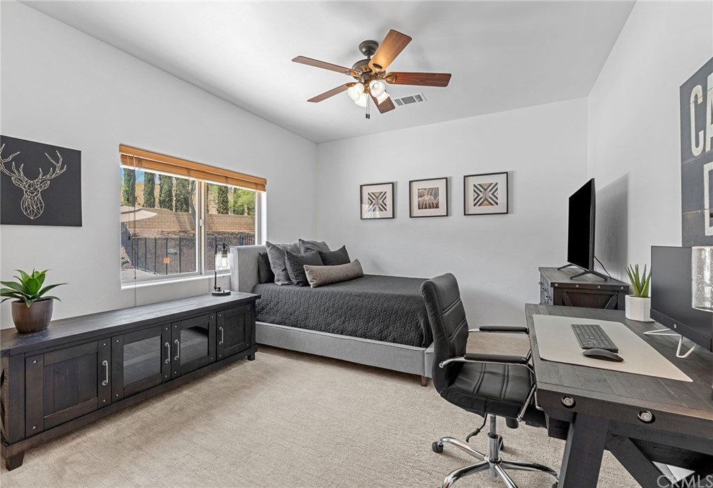 30620 Jedediah Smith Road Temecula, CA 92592 - Photo 25 of 36 a living room with furniture and a window