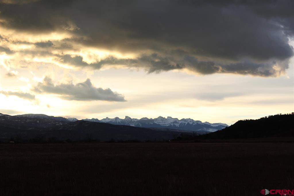 a view of mountains and valleys