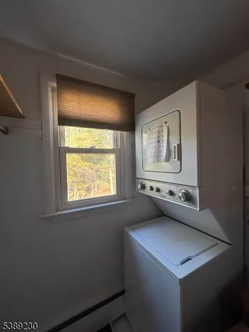 a room with car parked and window