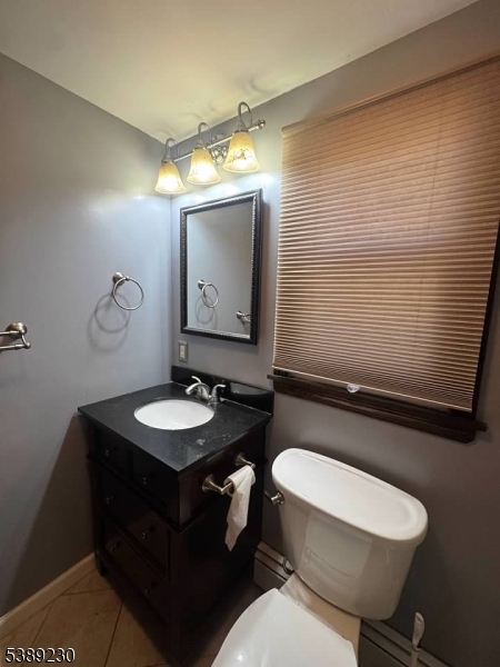 50 Jericho Road High Bridge, NJ 08829 - Photo 22 of 23 a bathroom with a toilet a sink and mirror