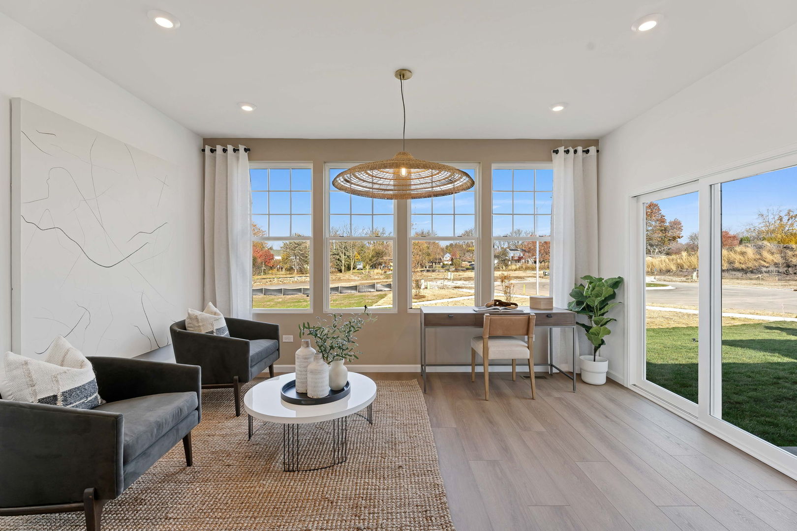 1035 Quarry Court, Unit 9 West Chicago, IL 60185 - Photo 16 of 23 a living room with furniture and a large window