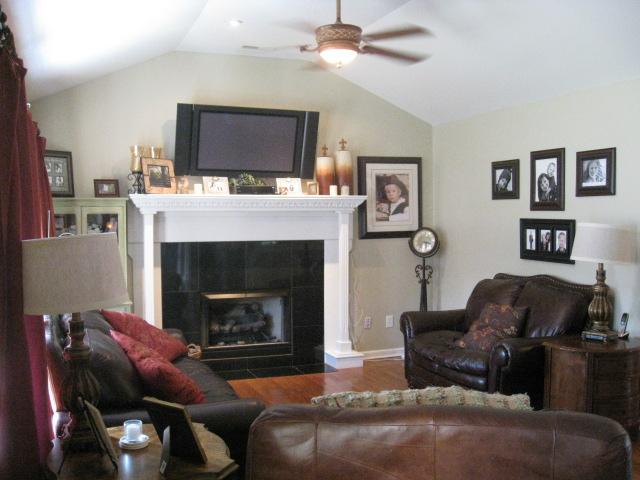 10025 Edwards Branch Road Primm Springs, TN 38476 - Photo 11 of 20 Cute living room with lovely fireplace to curl up around on winter days