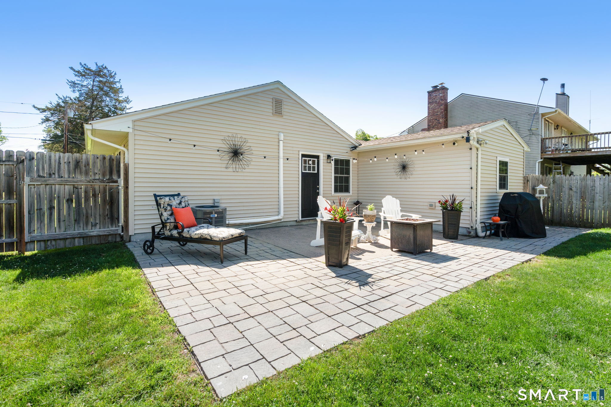 31 Cowan Street Suffield, CT 06078 - Photo 24 of 29 a view of a house with backyard and sitting area