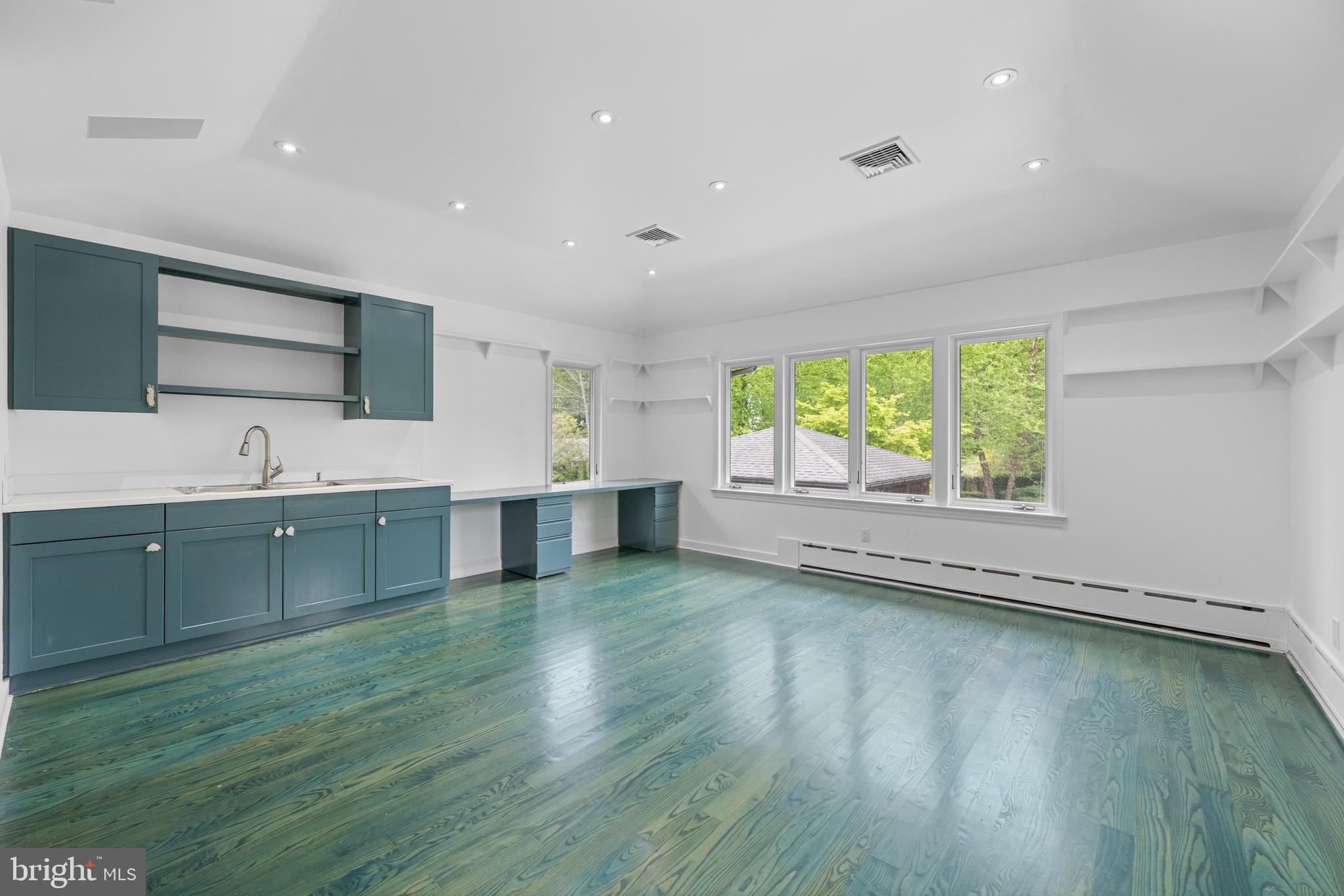 850 Lesley Road Villanova, PA 19085 - Photo 32 of 37 a view of kitchen with wooden floor and electronic appliances