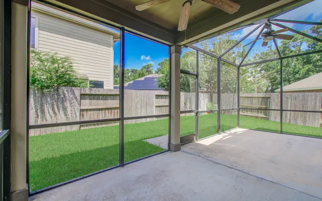 a view of backyard with green space