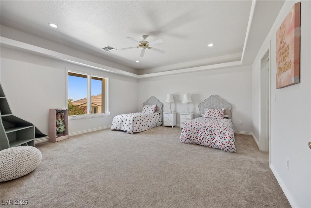 640 Quail Covey Road Henderson, NV 89002 - Photo 35 of 75 5th En-suite Bedroom featuring carpet floors, a raised ceiling, recessed lighting, and ceiling fan