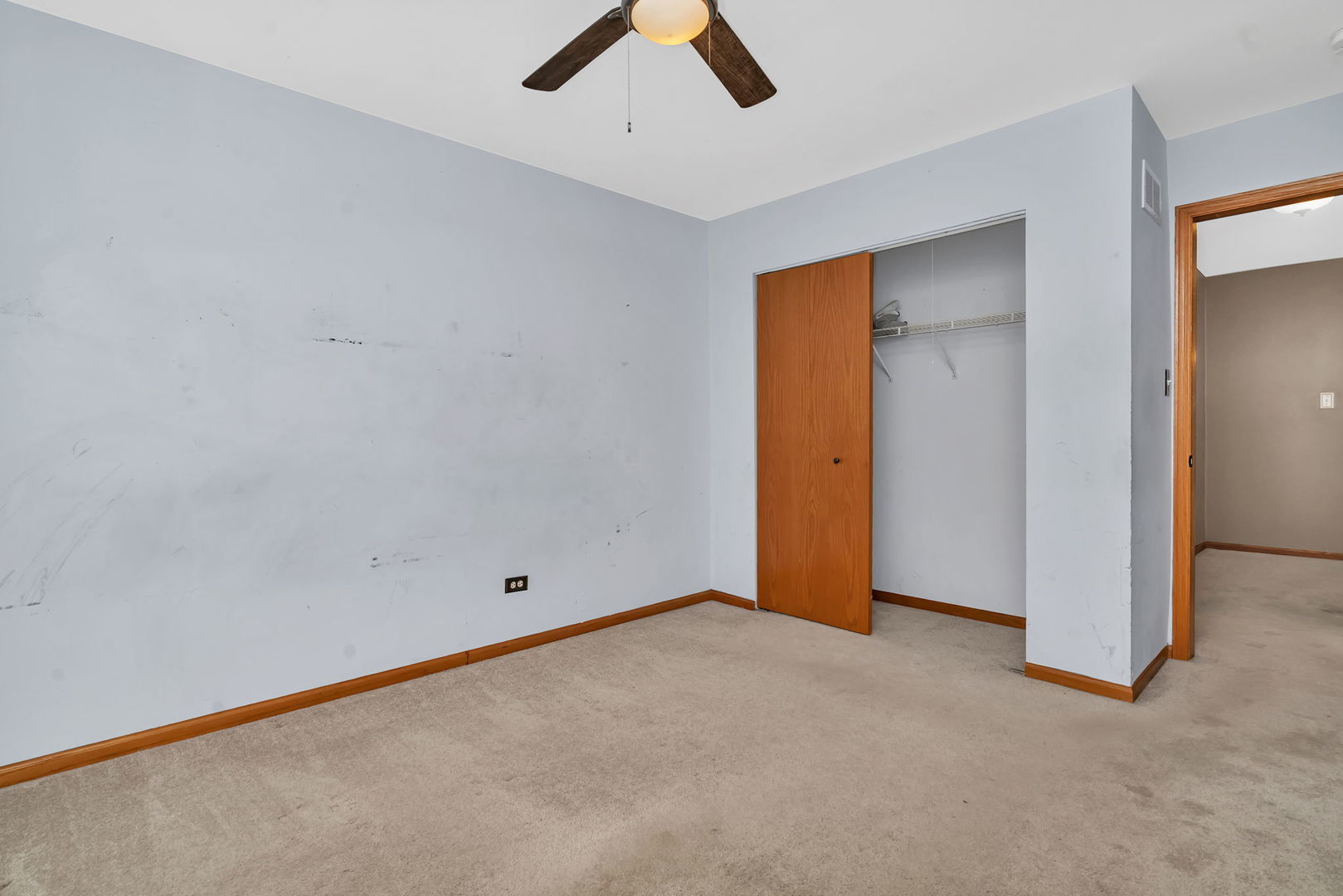 936 Treeline Court Lockport, IL 60441 - Photo 23 of 29 an empty room with ceiling fan and window
