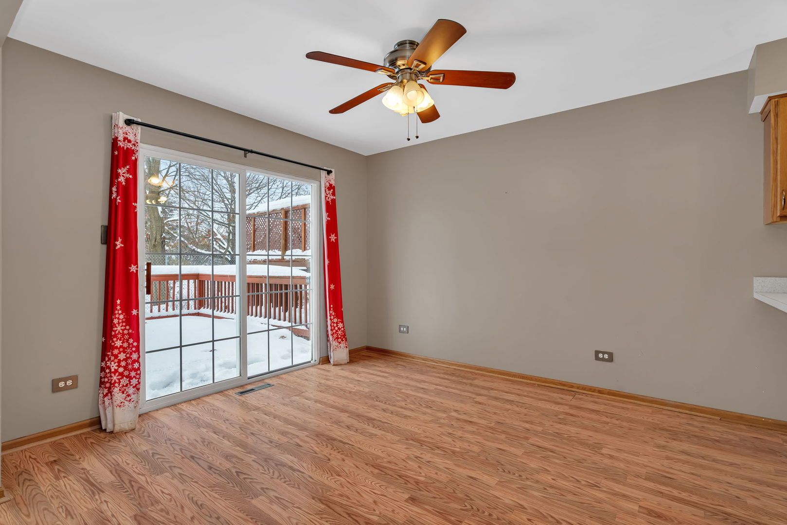 936 Treeline Court Lockport, IL 60441 - Photo 8 of 29 a view of empty room with wooden floor and fan