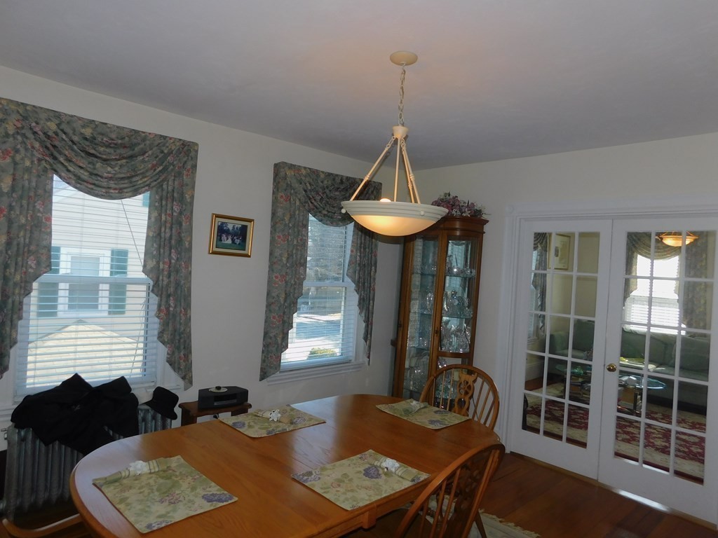 145 Lagrange Street Boston, MA 02132 - Photo 12 of 37 a view of a livingroom with furniture and window