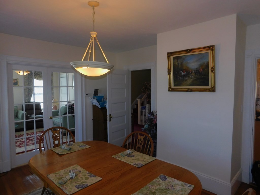 145 Lagrange Street Boston, MA 02132 - Photo 14 of 37 a bedroom with a bed and a desk