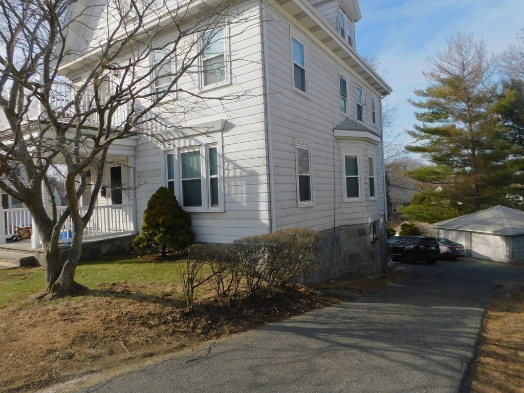145 Lagrange Street Boston, MA 02132 - Photo 2 of 37 a view of a house with a yard
