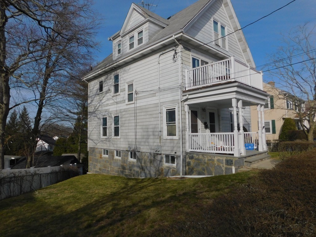 145 Lagrange Street Boston, MA 02132 - Photo 37 of 37 a view of house with yard