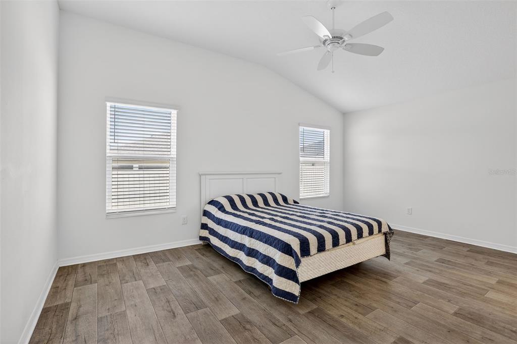 6273 Windham Way The Villages, FL 32163 - Photo 19 of 32 a room with a bed and a window