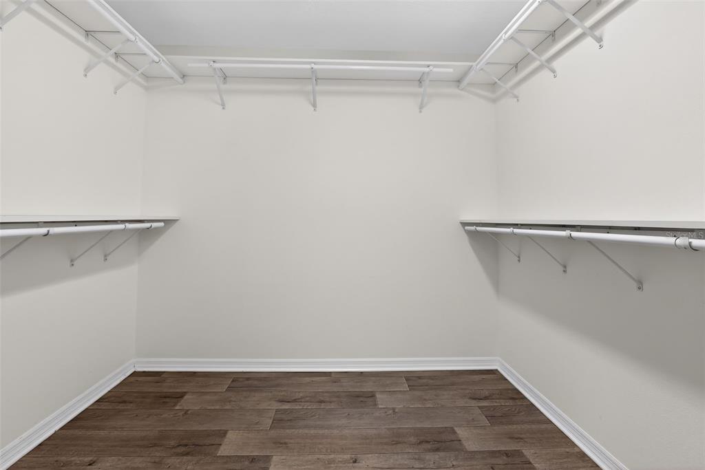 6273 Windham Way The Villages, FL 32163 - Photo 24 of 32 a view of a room with racks on the wall