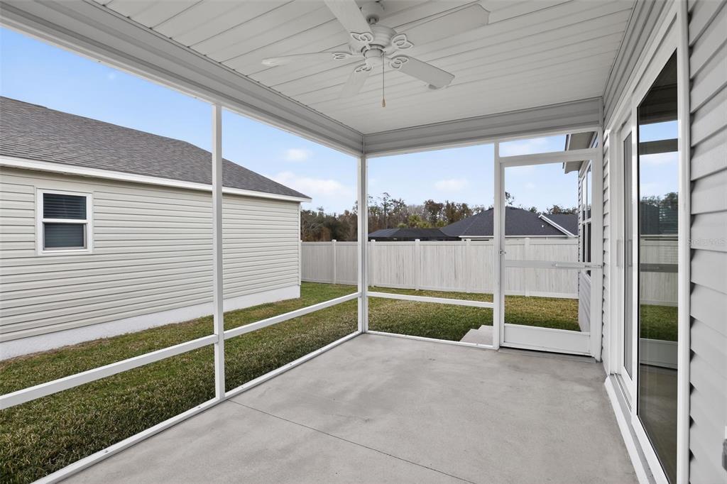 6273 Windham Way The Villages, FL 32163 - Photo 28 of 32 a view of backyard with green space