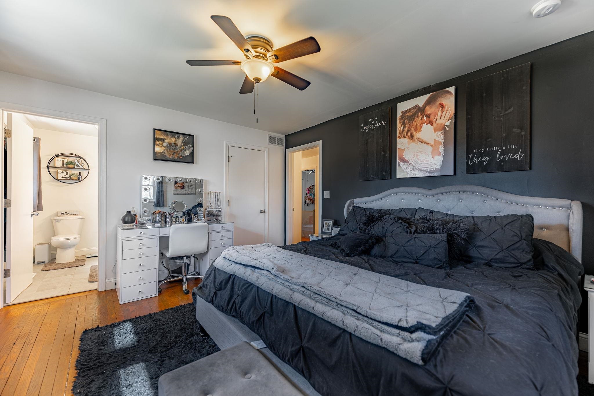 6912 Elevator Road Roscoe, IL 61073 - Photo 12 of 43 a bedroom with a large bed and a window