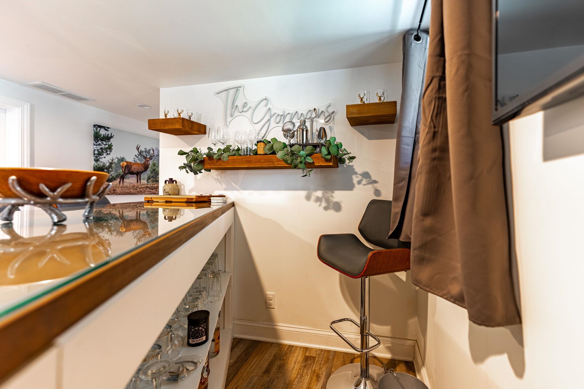 6912 Elevator Road Roscoe, IL 61073 - Photo 23 of 43 a view of a living room with furniture and floor to ceiling window