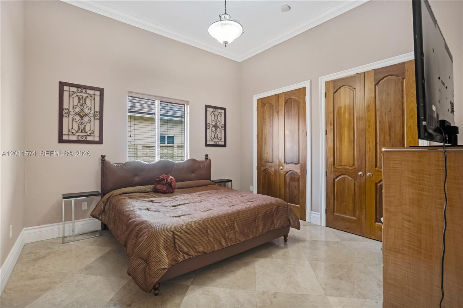 4025 Southwest 128th Avenue Miami, FL 33175 - Photo 22 of 93 a bedroom with a bed and wooden floor