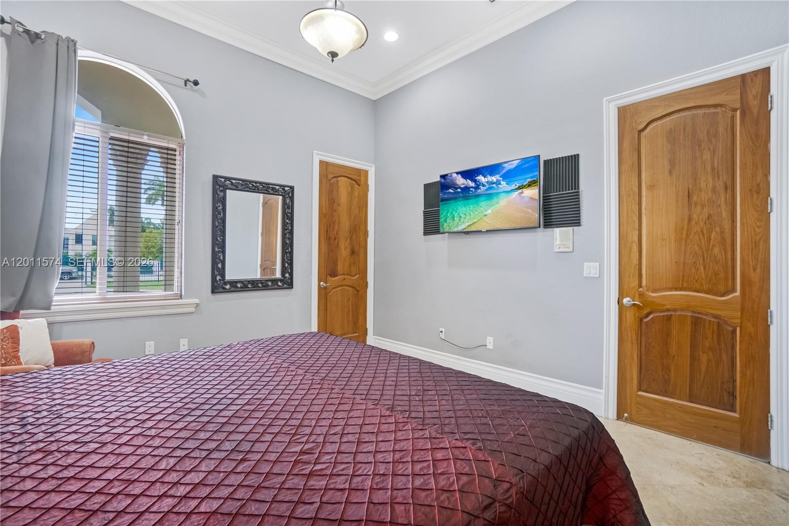 4025 Southwest 128th Avenue Miami, FL 33175 - Photo 32 of 93 a bedroom with a bed and a painting on the wall