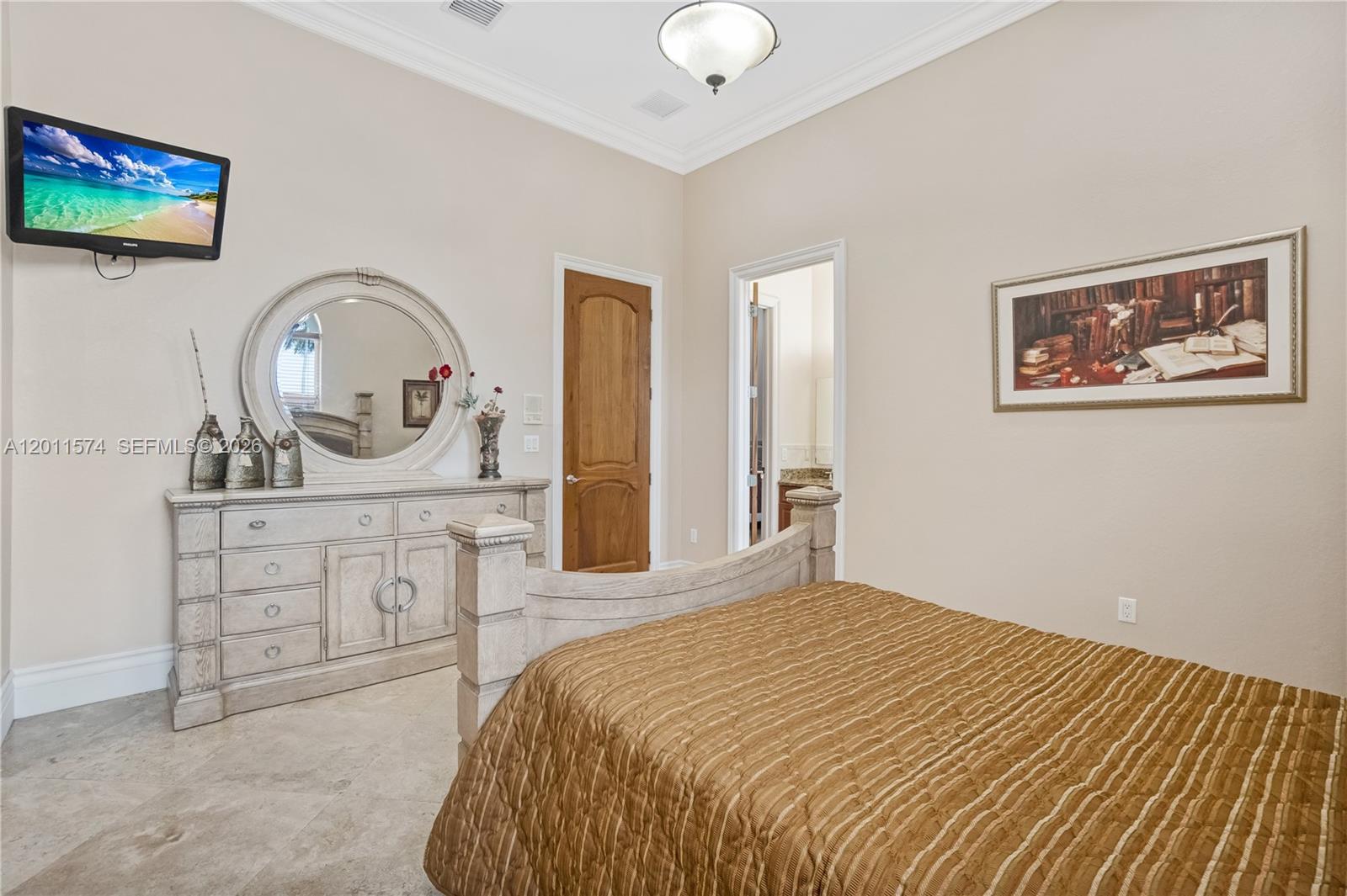 4025 Southwest 128th Avenue Miami, FL 33175 - Photo 34 of 93 a bedroom with a bed and a dresser