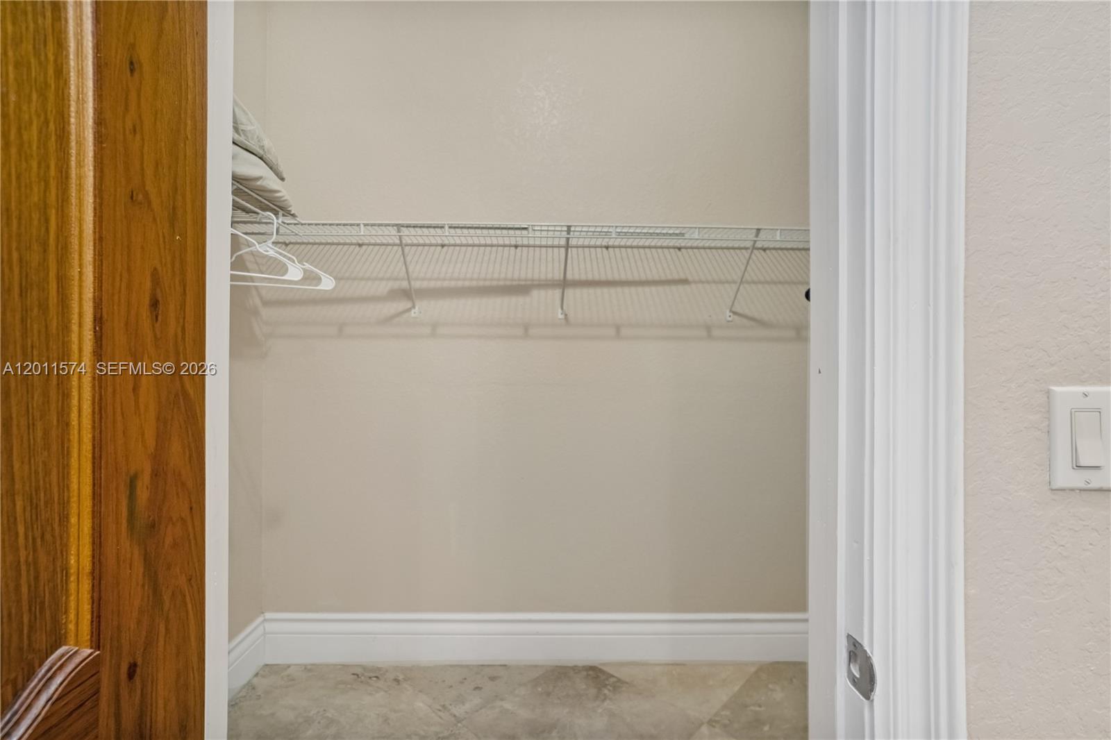 4025 Southwest 128th Avenue Miami, FL 33175 - Photo 35 of 93 a view of a room with racks on the wall