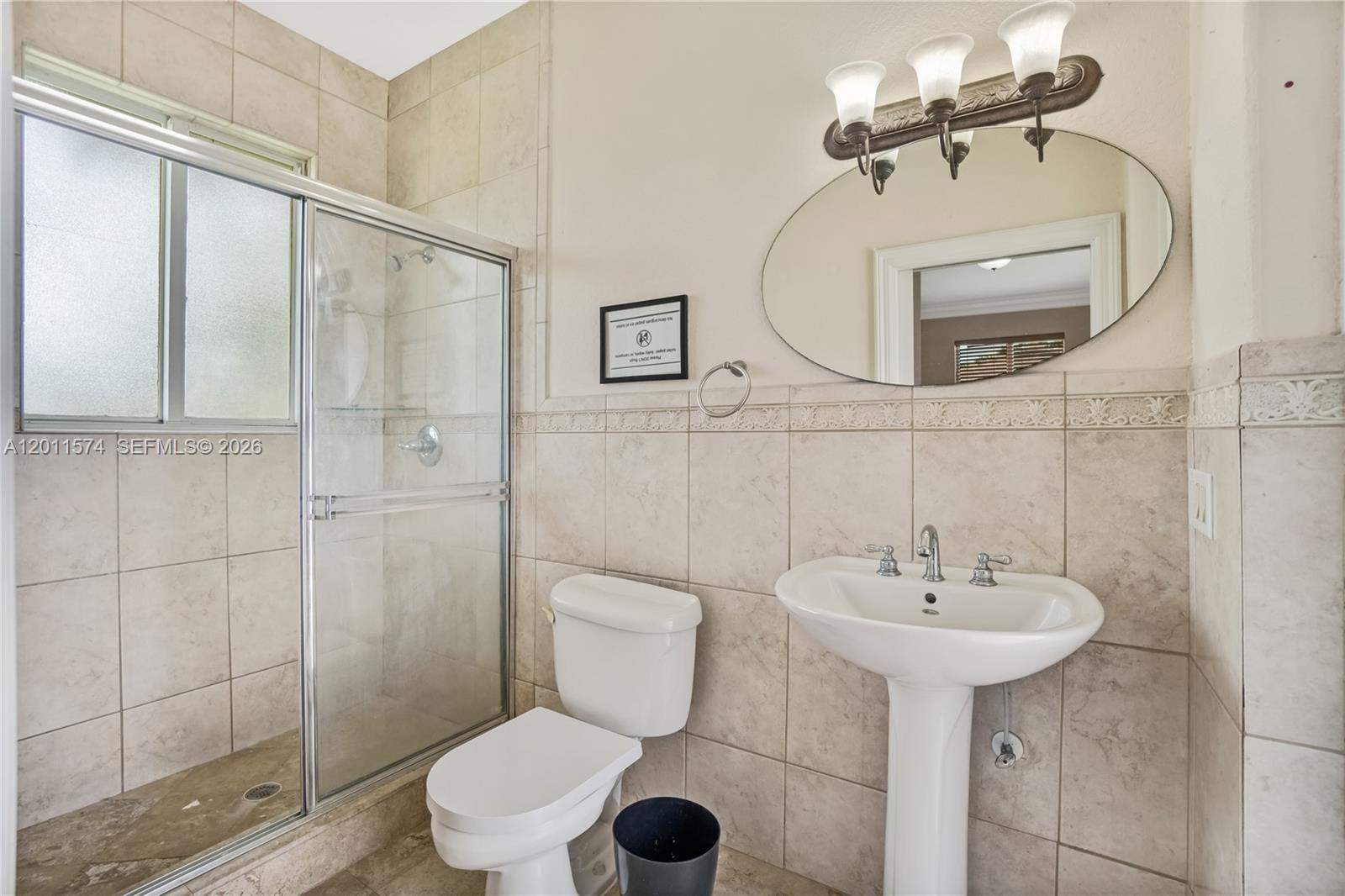 4025 Southwest 128th Avenue Miami, FL 33175 - Photo 48 of 93 a bathroom with a toilet sink and a shower