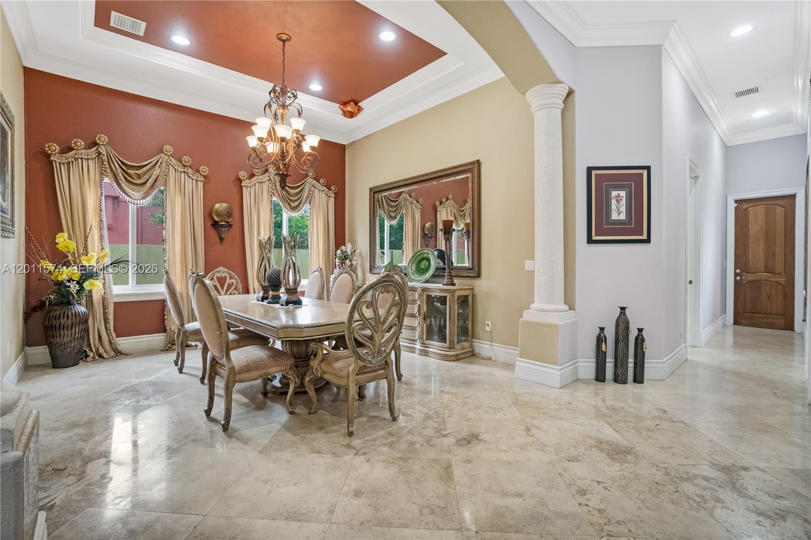 4025 Southwest 128th Avenue Miami, FL 33175 - Photo 58 of 93 a view of a dining room with furniture and chandelier